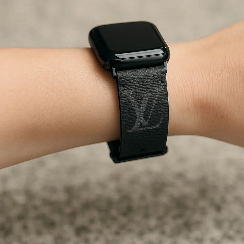 Upcycled designer Apple Watch band styled on the wrist, showcasing quiet-luxury craftsmanship and authentic repurposed materials.