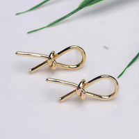 ClaudiaG Knot Earrings