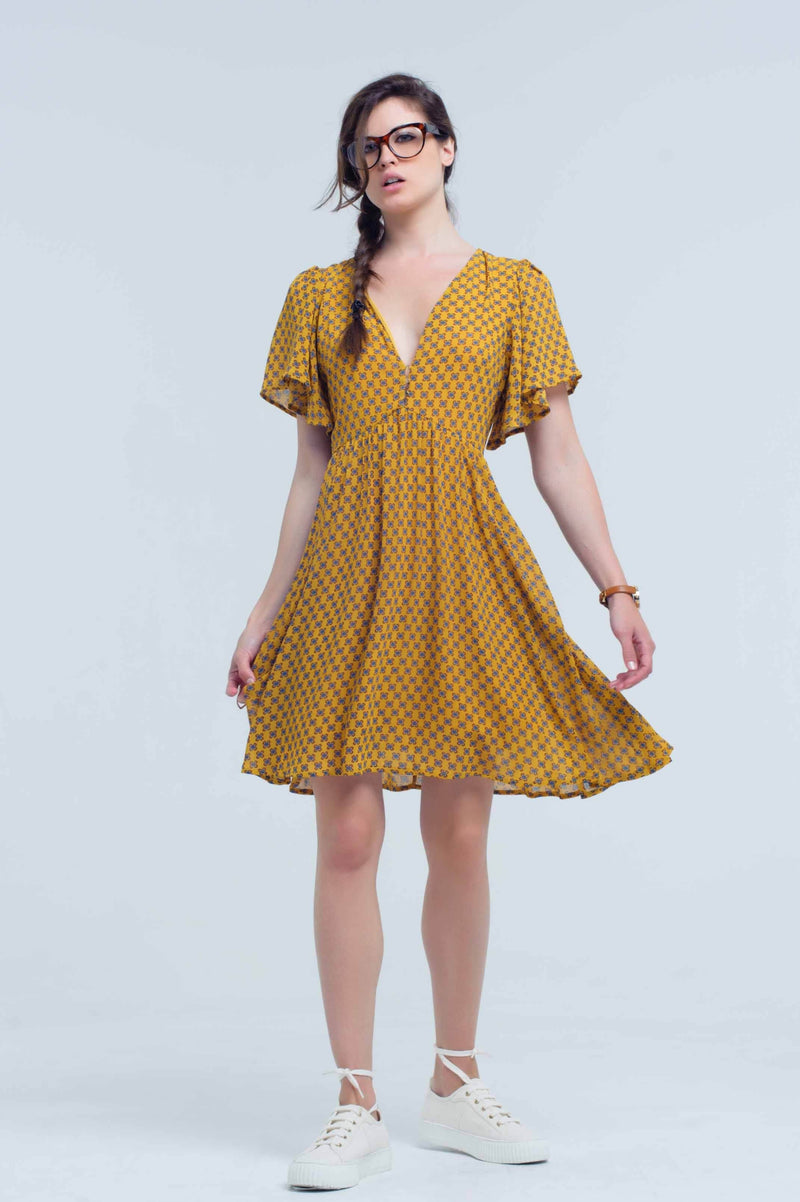 Q2 Dresses Yellow dress with flight and geometric pattern