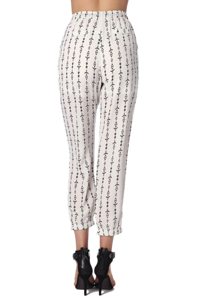 Q2 Pants Cream pants with contrast geo-tribal print