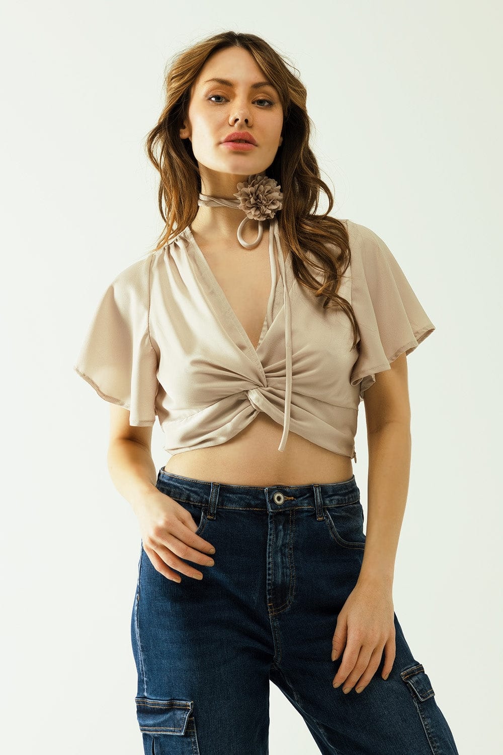 Q2 Women's Blouse Beige V-Neck Crop Top With Short Sleeves And A Flower Detail On The Neck