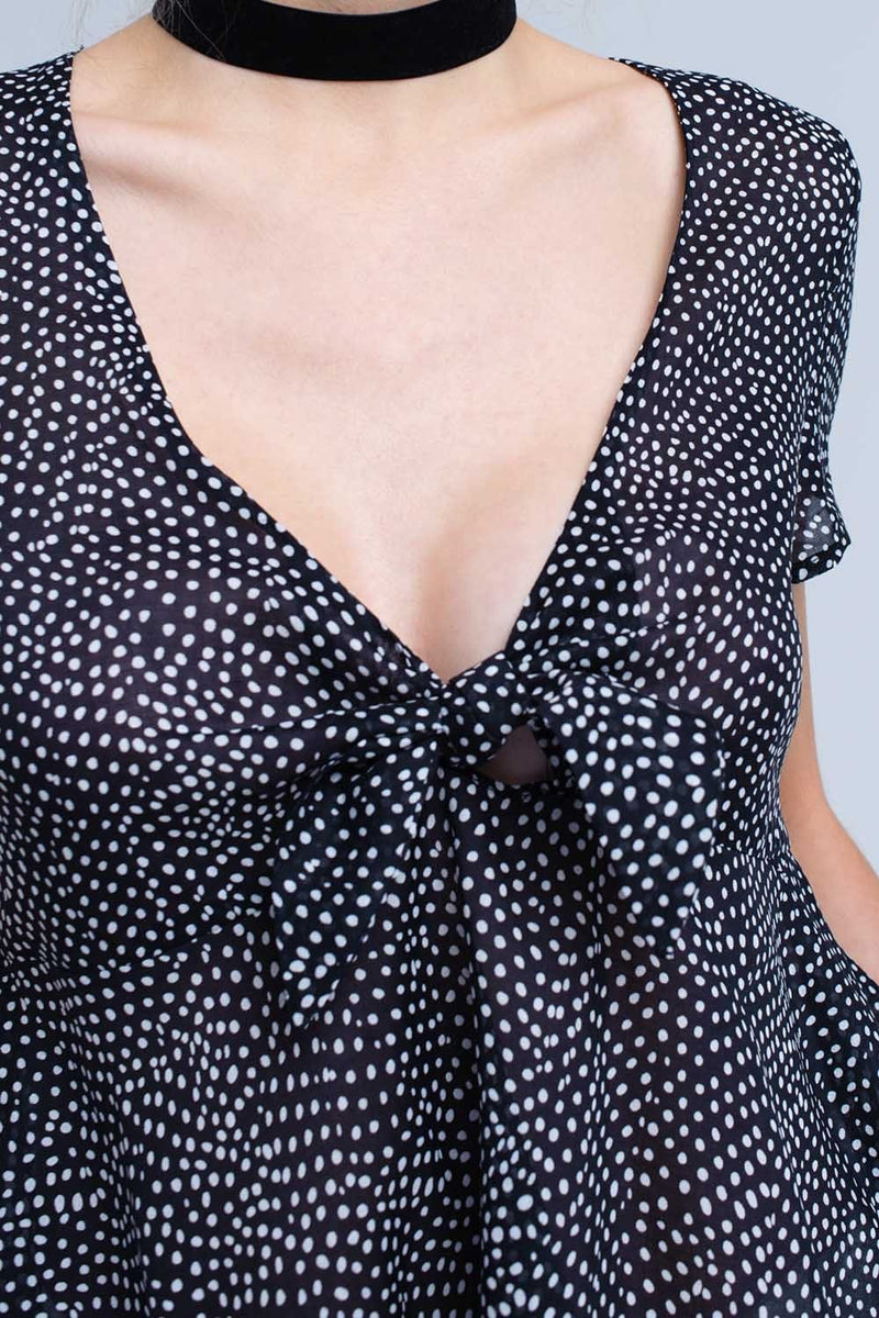 Q2 Women's Blouse Black polka dot top with ruffle hem