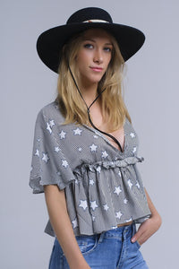 Q2 Women's Blouse Black top with stars and ruffle