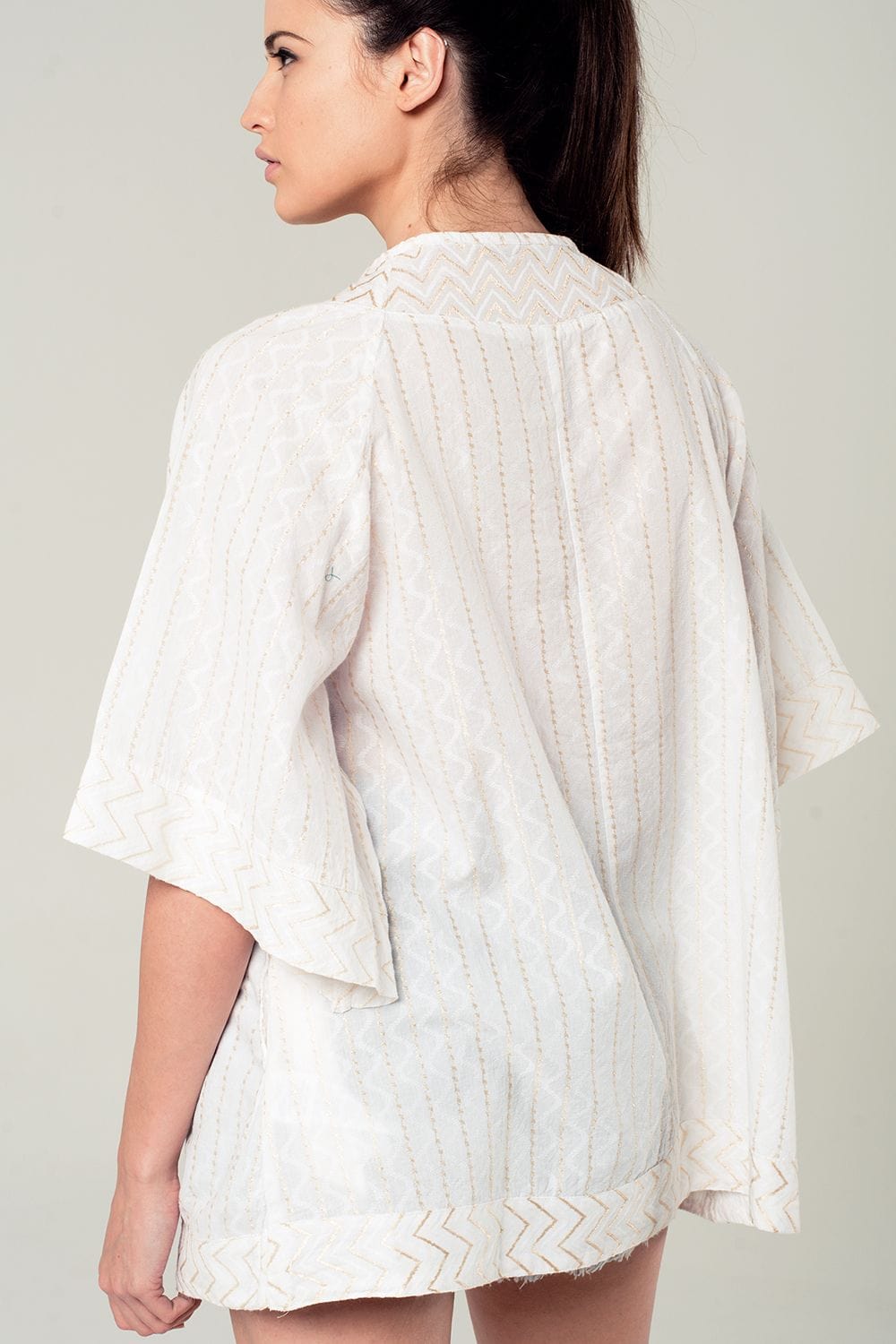 Q2 Women's Blouse Embellished white mini dress with embroidery detailing