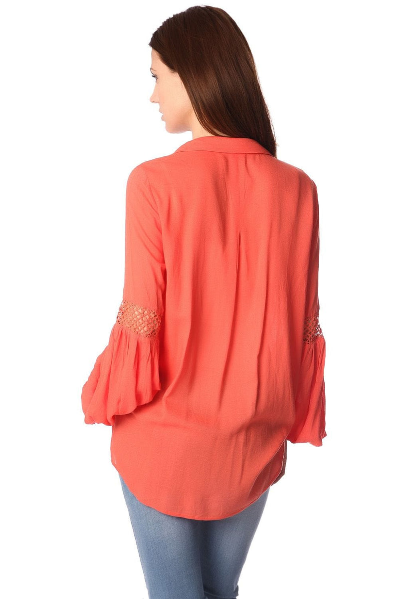 Q2 Women's Blouse Orange blouse with wrap front and draped detail