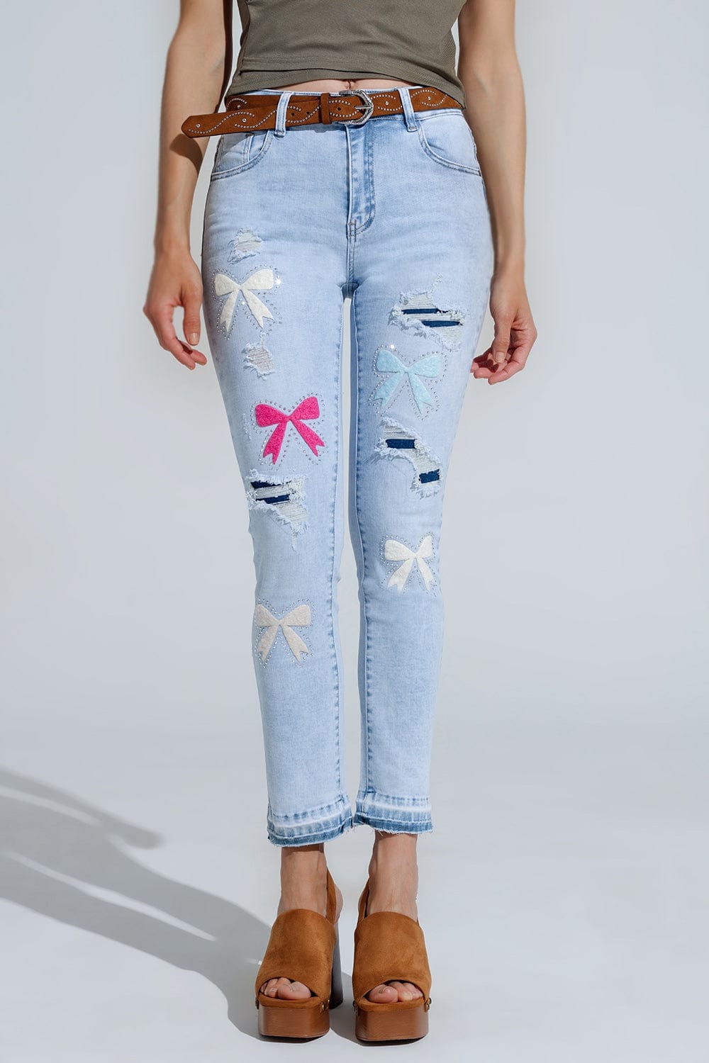 Q2 Women's Jean Light Blue Super Skinny Jeans With Bow Ties And Ripped Holes