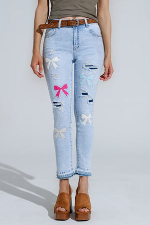 Q2 Women's Jean Light Blue Super Skinny Jeans With Bow Ties And Ripped Holes