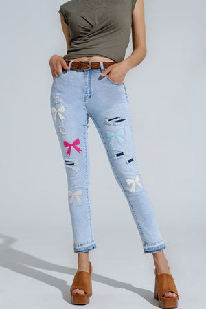 Q2 Women's Jean Light Blue Super Skinny Jeans With Bow Ties And Ripped Holes