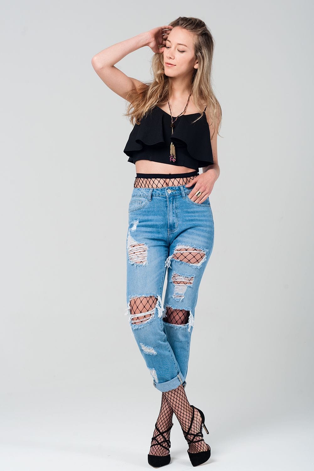 Q2 Women's Jean Ripped mom jeans with fishnet tights
