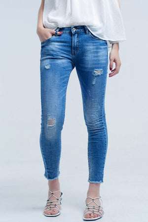 Q2 Women's Jean Skinny jeans in medium wash with rips