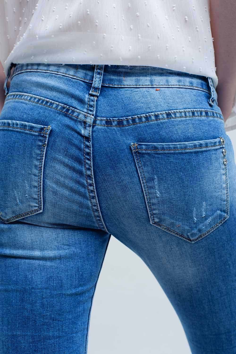 Q2 Women's Jean Skinny jeans in medium wash with rips