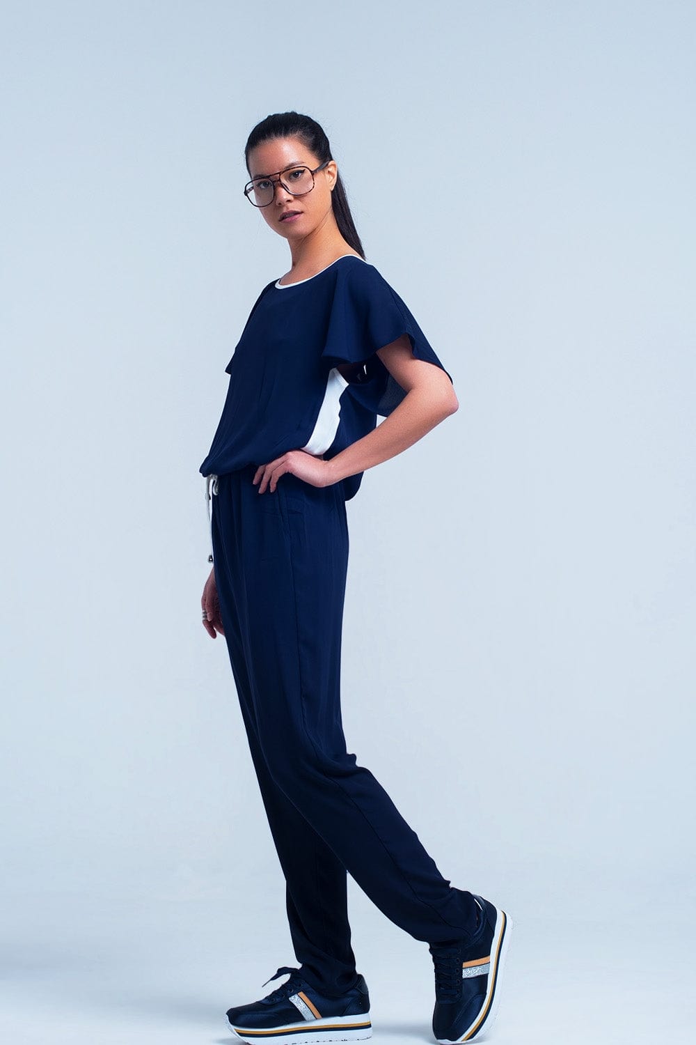 Q2 Women's Jumpsuits & Rompers Navy blue jumpsuit with short sleeve and ruffle detail