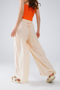 Q2 Women's Pants & Trousers Beige Palazzo Style Pants With Side Pockets And Thick Waist Band