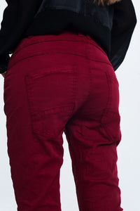 Q2 Women's Pants & Trousers Drop Crotch Skinny Jean in Maroon