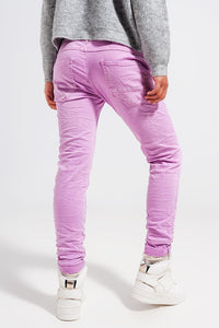 Q2 Women's Pants & Trousers Exposed Buttons Skinny Jeans in Pink