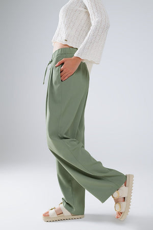 Q2 Women's Pants & Trousers Pants In Green With Front Pockets And Drawstring Closing