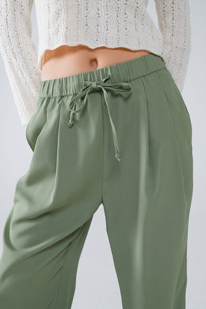 Q2 Women's Pants & Trousers Pants In Green With Front Pockets And Drawstring Closing