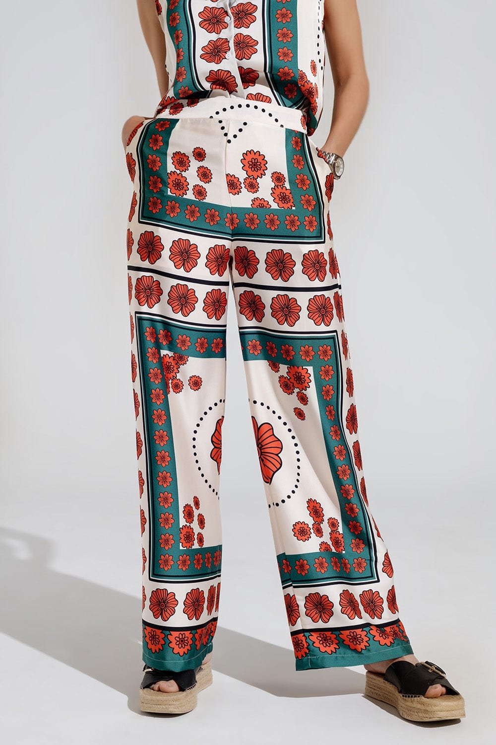 Q2 Women's Pants & Trousers Satin Creme Flared Pants With Floral Design