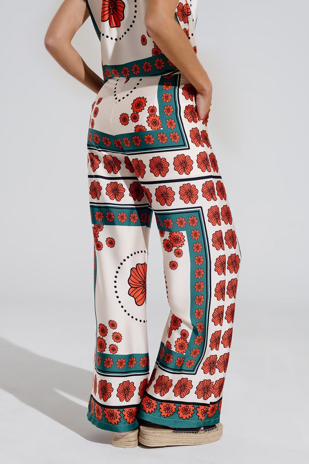 Q2 Women's Pants & Trousers Satin Creme Flared Pants With Floral Design