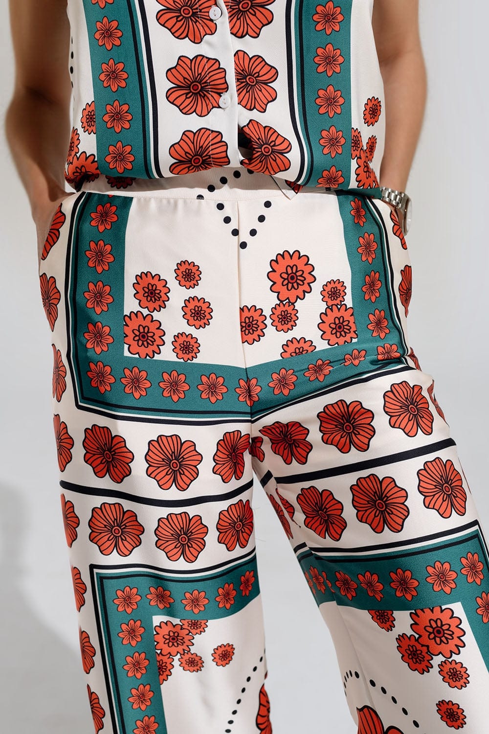 Q2 Women's Pants & Trousers Satin Creme Flared Pants With Floral Design