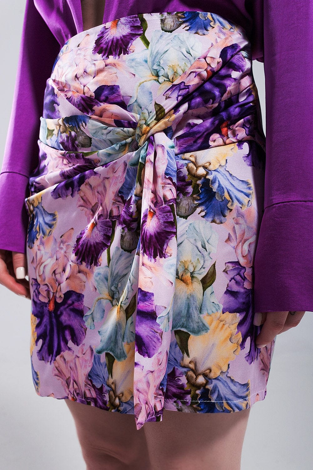 Q2 Women's Skirt Mini Skirt with Knot Front in Purple Clashing Floral