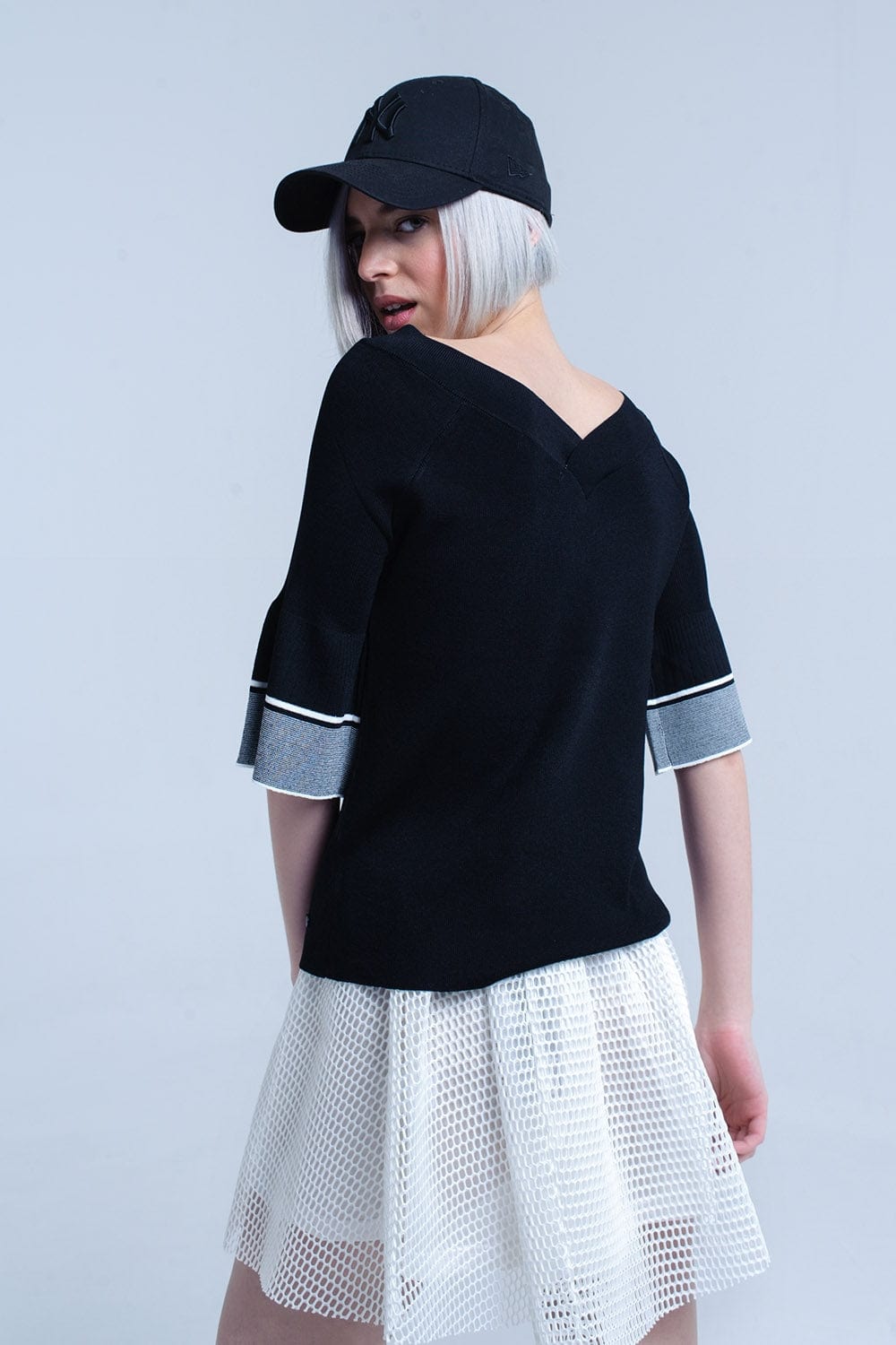 Q2 Women's Sweater Black knit sweater with bell sleeve