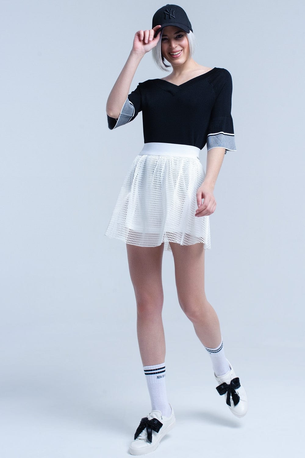 Q2 Women's Sweater Black knit sweater with bell sleeve