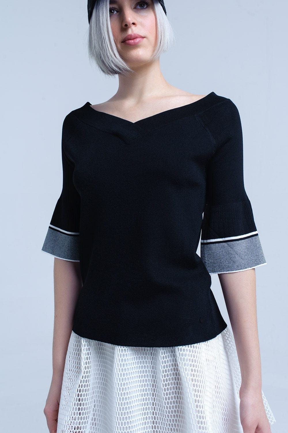 Q2 Women's Sweater Black knit sweater with bell sleeve