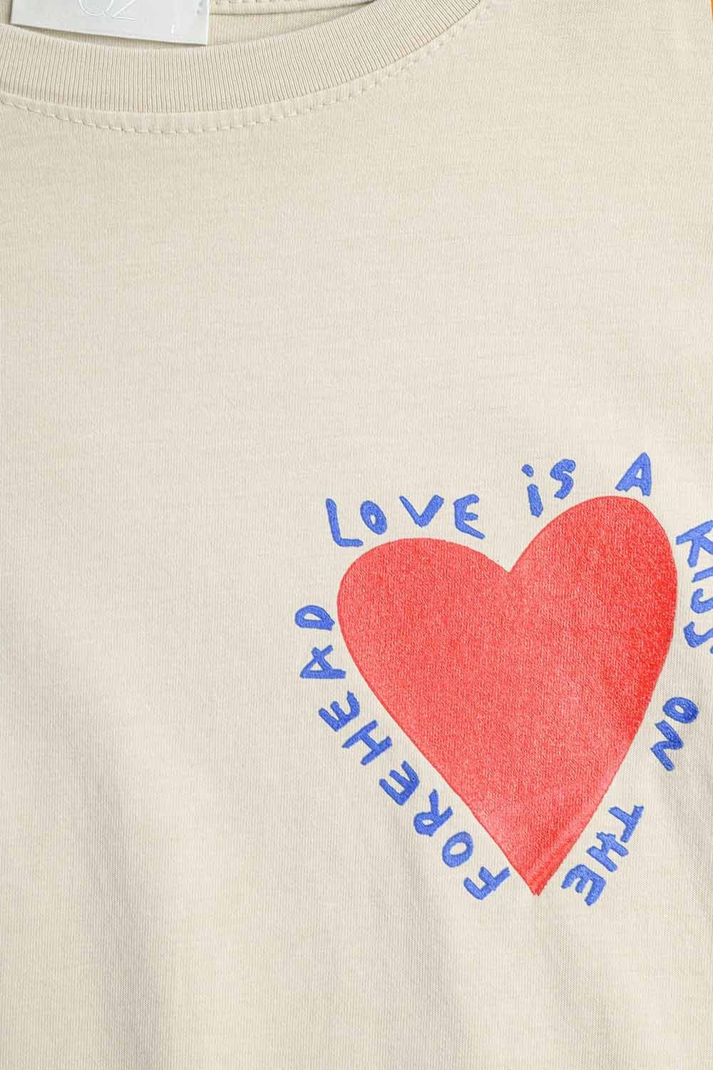 Q2 Women's Tees & Tanks One Size / Beige Relaxed Beige T-Shirt Featuring A Heart Design On Both The Front And Back