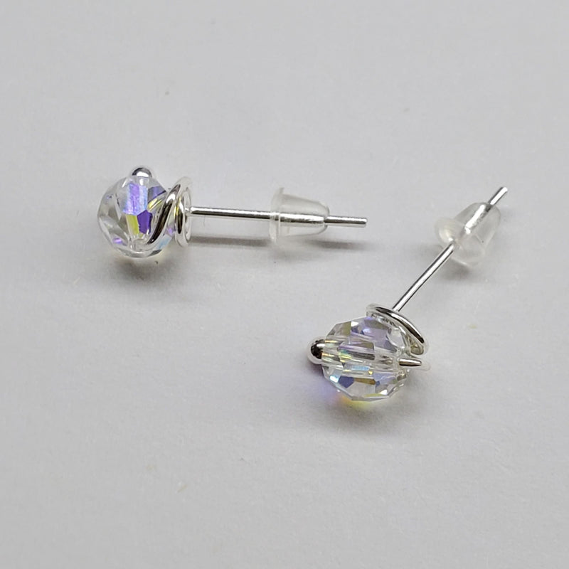 6mm Crystal AB sterling silver crystal ear studs laying on paper-Alexa Martha Designs