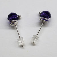 Purple sterling silver crystal ear studs laying on paper-Alexa Martha Designs