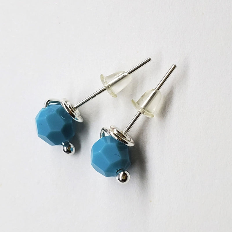 Turquoise sterling silver crystal ear studs laying on paper-Alexa Martha Designs