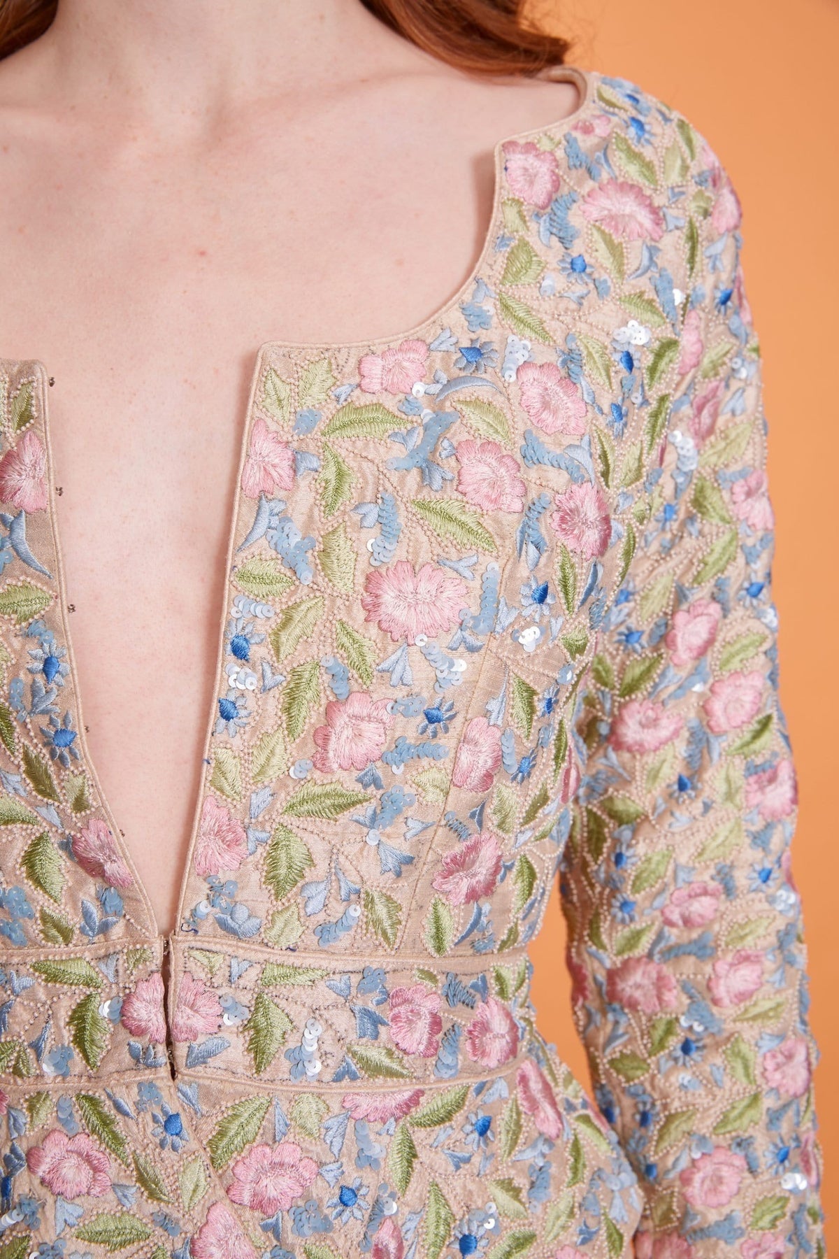 Lavanya Coodly Apparel & Accessories > Clothing > Blazers Lavanya Coodly Hand-Embroidered Multicolor on Blush Roanne Cropped Jacket with Peplum Hem, Scalloped Neckline, nd Elongating Sleeves