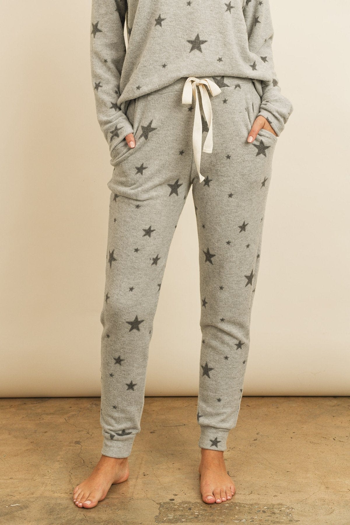 Riah Fashion Women's Fashion - Women's Clothing - Suits & Sets - Women's Sets Riah Star Print Brushed Top and Joggers Set With Self Tie