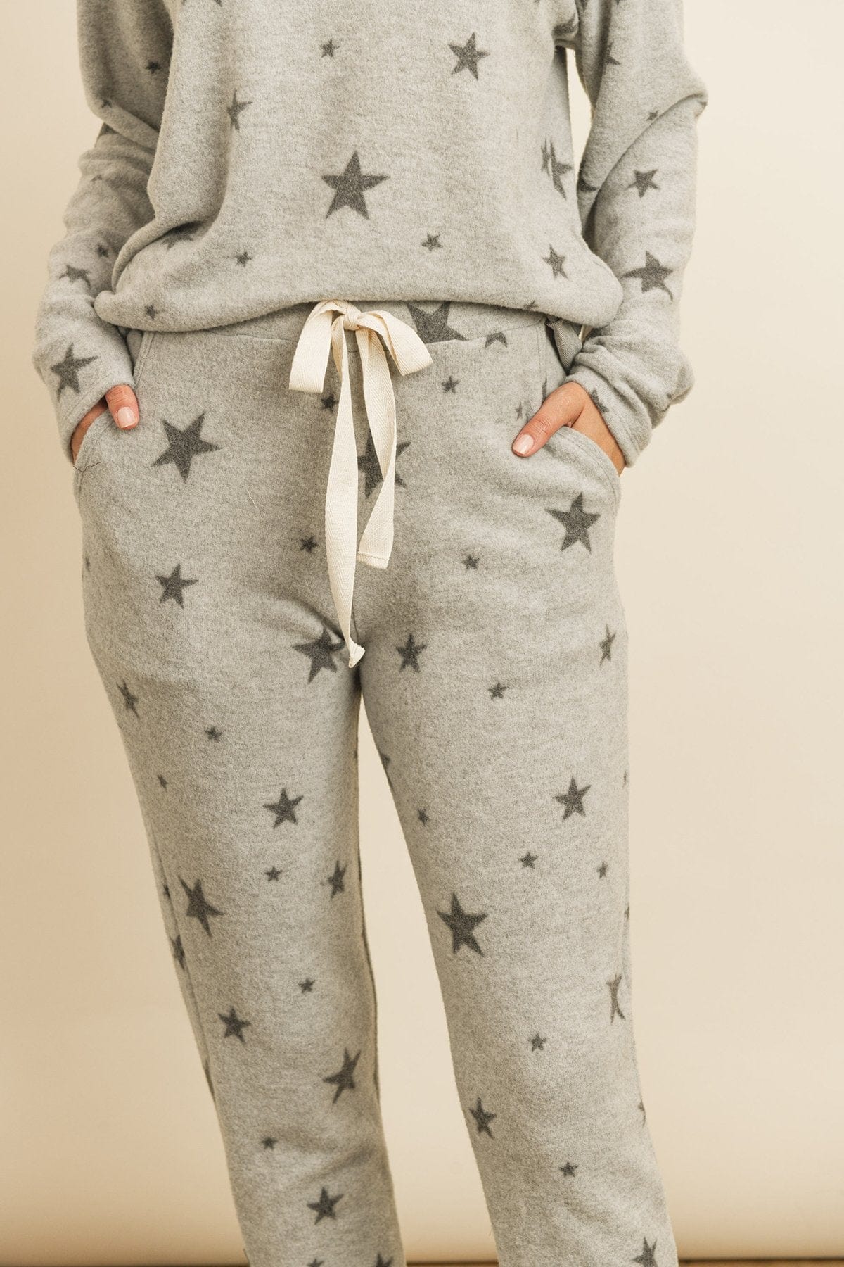 Riah Fashion Women's Fashion - Women's Clothing - Suits & Sets - Women's Sets Riah Star Print Brushed Top and Joggers Set With Self Tie