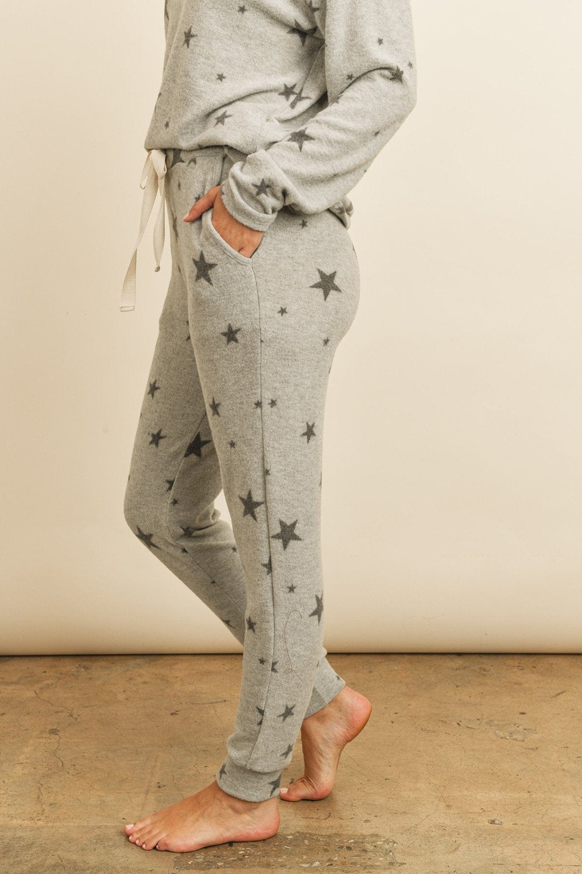 Riah Fashion Women's Fashion - Women's Clothing - Suits & Sets - Women's Sets Riah Star Print Brushed Top and Joggers Set With Self Tie
